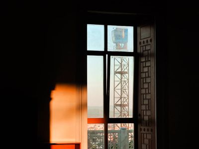 View of a calm, empty room ready for a yoga session.